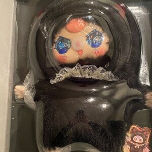 Adorable Black and White Plush Doll